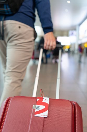 Man who is packing is luggage.